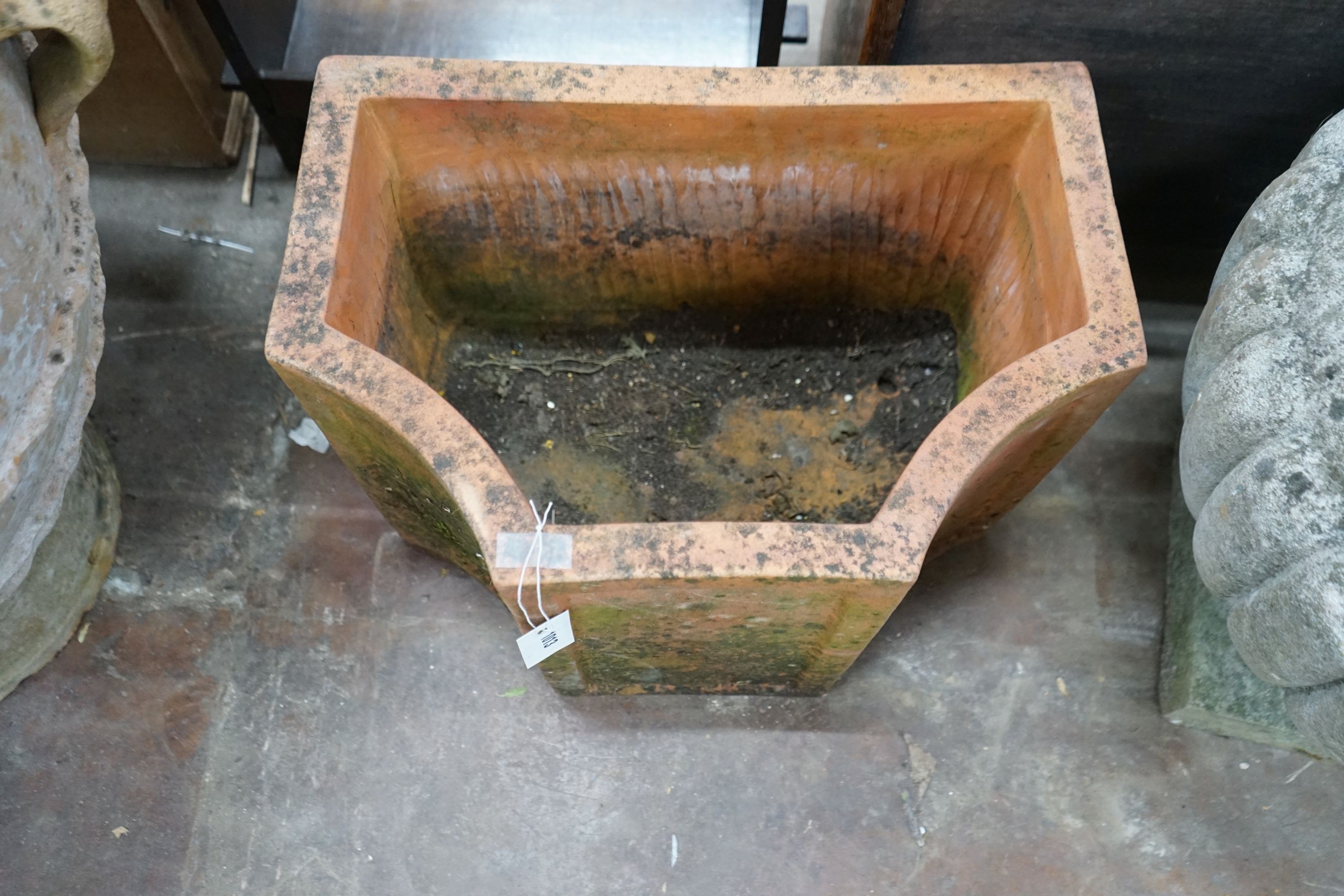 A terracotta garden planter of shaped rectangular form, width 52cm, depth 35cm, height 36cm